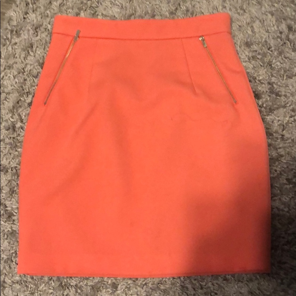 Pink pencil skirt with gold zippers